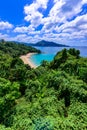 Tropical Laem Sing beach. Beautiful turquoise bay and people relaxing on beach. Paradise coast of Phuket, Thailand