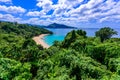 Tropical Laem Sing beach. Beautiful turquoise bay and people relaxing on beach. Paradise coast of Phuket, Thailand