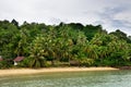 Tropical landscape with amber sand beach, rocks, coconut palm trees and turquoise tropical sea on Koh Chang Island in Thailand Royalty Free Stock Photo