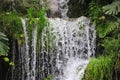 . Beautiful hidden waterfall in rainforest. Adventure and travel concept. Nature background. Slow shutter speed Royalty Free Stock Photo