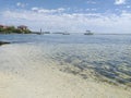 Tropical landscape with calm turquoise waters of the Caribbean Sea with pleasure boats and Caribbean blue sky. Idyllic background Royalty Free Stock Photo