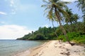 Tropical landscape with deserted amber sand beach, coconut palm trees and turquoise tropical sea on Koh Chang Island in Thailand Royalty Free Stock Photo