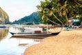 Tropical landscape with traditional boats of the Philippines. boats standing at the shore of Elnido, the island of Palawan Royalty Free Stock Photo