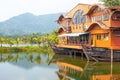 Tropical landscape. Wooden house in the form of a boat on the ocean Travel and tourism in Asia