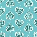 Tropical leaf pattern design in green and teal, modern vector seamless repeat of hand drawn palm leaves. Royalty Free Stock Photo