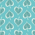 Tropical leaf pattern design in green and teal, modern vector seamless repeat of hand drawn palm leaves.