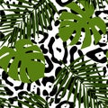 Tropical leaves and animal skin seamless pattern. Royalty Free Stock Photo