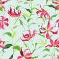 Tropical Leaves and Floral Background - Fire Lily Flowers - Seamless Pattern Royalty Free Stock Photo