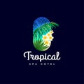 Tropical logo. Spa hotel emblem. Palm leaves and tropical flowers.