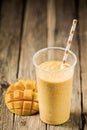 Tropical mango smoothie with fresh fruit