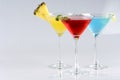 Tropical Martini style drinks with fruit & garnish