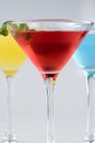 Tropical Martini style drinks with fruit & garnish