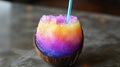 A tropical mocktail with vibrant colors served in a coconut with a straw pic Royalty Free Stock Photo