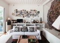 Tropical modern beach house white tone living room interior Royalty Free Stock Photo