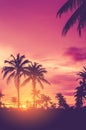 Tropical palm tree with colorful bokeh sun light on sunset sky cloud abstract background Royalty Free Stock Photo