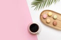 Tropical palm tree leaf and coffee on a pink background. Vibrant minimal fashion concept. Royalty Free Stock Photo