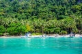 Tropical Papaya beach at paradise coast, El Nido, Palawan, Philippines. Tour A Route. Coral reef and sharp limestone cliffs