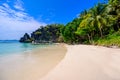 Tropical Papaya beach at paradise coast, El Nido, Palawan, Philippines. Tour A Route. Coral reef and sharp limestone cliffs