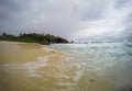 Tropical paradise beach with palms, white sand, and turquoise water at the Police Bay in Mahe Island, Seychelles during summer Royalty Free Stock Photo