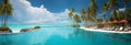 Tropical paradise: Beachfront resort, pool, palm trees, blue skies   perfect summer Royalty Free Stock Photo