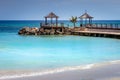 Tropical paradise: caribbean beach with pier and gazebo, Montego Bay, Jamaica Royalty Free Stock Photo