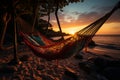 Tropical paradise, hammock on a sunset beach, epitomizing a perfect vacation Royalty Free Stock Photo