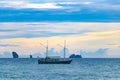 Tropical paradise sunset turquoise water beach limestone rocks Krabi Thailand