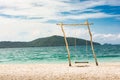 Tropical Paradise Swings over Crystal Clear Turquoise, Blue Ocean, Sea Water in Koh Samui THAILAND Royalty Free Stock Photo