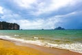 Tropical paradise turquoise water beach and limestone rocks Krabi Thailand