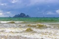 Tropical paradise turquoise water beach and limestone rocks Krabi Thailand