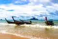 Tropical paradise turquoise water beach longtail boat Krabi Thailand