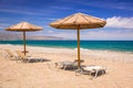 Tropical parasols at Maleme beach on Crete Royalty Free Stock Photo