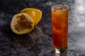 Tropical passion fruit cocktail in long glass