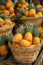 Tropical pineapples in baskets by beach fruit stand warehouse for vibrant vacation vibes