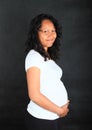 Tropical pregnant woman in white t-shirt Royalty Free Stock Photo