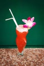 Tropical Red Cocktail with Orchid Royalty Free Stock Photo