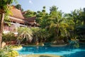 Swimming pool at a resort in Phuket, Thailand. Nice green garden suronding-2 Royalty Free Stock Photo