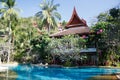 Swimming pool at a resort in Phuket, Thailand. Nice green garden suronding Royalty Free Stock Photo