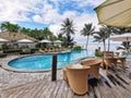 A tropical resort with a pool, coconut palms and lagoon view on the tropical island of Rarotonga on the Cook Islands Royalty Free Stock Photo