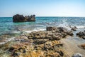 Tropical resort sea beach on summer vacation. Beach with rocks Royalty Free Stock Photo