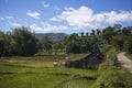 Tropical rural landscape with simple rustic hut. Mountain landscape with terrace rice fields.