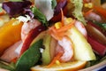 Tropical salad with fruits, prawns, cocktail sauce, kiwi, orange slices and sweet corn Royalty Free Stock Photo
