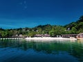 tropical sandbeach with blue sea