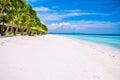 Tropical sandy beach at Panglao Bohol island with Sme Beach chairs under palm trees. Travel Vacation. Philippines Royalty Free Stock Photo