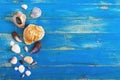 Tropical sea background. Different shells on the blue boards, top view. Free space for inscriptions. Summer theme Royalty Free Stock Photo