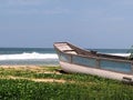 Tropical sea, beach and canoe on the shore ,Ahungalle, Sri Lanka. Royalty Free Stock Photo