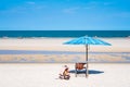 Tropical sea and beach with umbrella and deck chair wiht blue sky.Thai summer Royalty Free Stock Photo