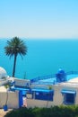 Tropical sea view in arab city Sidi Bou Said, Tunisia. June, 2019 Royalty Free Stock Photo