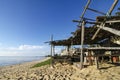 tropical sea view under wooden hut at sunny day. sandy beach and blue sky. Royalty Free Stock Photo