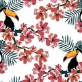 Tropical seamless pattern with cute birds,leafs and flowers.Summer vector background with toucans.Textile texture